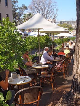 Outdoor courtyard seating at La Renaissance in The Rocks